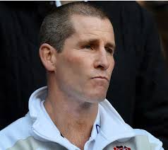 Wade applies a gloss finish