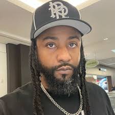 Drake in Australia signing a vinyl for a young fan.