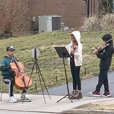 Super Bowl concert: Siblings stage sidewalk 'symphony' for the ...