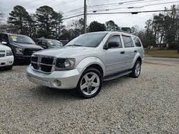 Image result for Deep Coral Red 2007 Durango