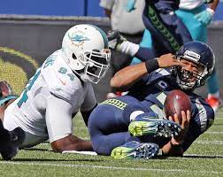 Seahawks Quarterback Russell Wilson S Late Heroics Hand Dolphins Brutal Loss Dolphins Mario Williams Russell Wilson