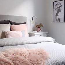 It has a wooden pink upholstered accent chair fitted with a unique gray throw pillow. Pin On Bedroom Inspiration