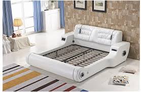 Genuine leather + artificial leather+solid wood frame. Modern Lift Tv Bed With Mattress King Size Leather Bed With Tv In Footboard Bedroom Sets Aliexpress
