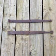 After rebuilding the garden barn last year i procrastinated for a time before putting on the last door hinge. Antique Hand Forged Strap Hinges Barn Door Hardware Etsy