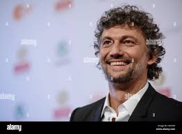 Berlin, Germany. 09th Oct, 2016. German opera singer Jonas Kaufmann poses  with his trophy (category: bestseller of the year) during the Echo  classical music awards show 2016 in Berlin, Germany, 09 October