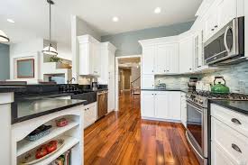 Maybe you would like to learn more about one of these? Soapstone Pendant Lights White Cabinets Sonoma Glass Tile Tiger Wood Floors Tigerwood Flooring Kitchen Remodel New Kitchen