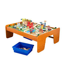 A working crane loads and unloads cargo from the train and a sturdy, molded plastic railroad track encircles the whole train table. Kidkraft Ride Around Town Train Table And Set