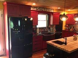 Barn Red Antiqued Kitchen Cabinets By Pro Cabinets Marion Illinois Cream Separator S Antique Kitchen Cabinets Copper Bar Sink Black French Door Refrigerator