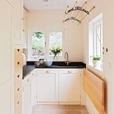 It acts as a utility room, storing necessities like cleaning products, light bulbs, and batteries. Small Utility Room Ideas The Furniture Cave