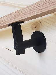Modern Hand Rail Bracket Made From Mild Steel Then Powder Coated Either White Or Black Easily A Modern Stair Railing Steel Stair Railing Metal Stair Railing