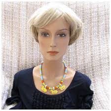 Vintage Flying Colors Yellow Ducks Ceramic Necklace. For Sale at Ruby Lane