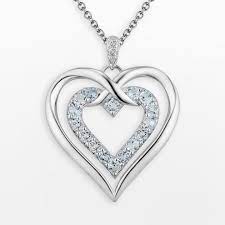 Two Hearts Forever One Sterling Silver Sky Blue Topaz And Diamond Accent Double Heart Pe Sterling Silver Heart Pendant Sterling Silver Heart Blue Topaz Jewelry