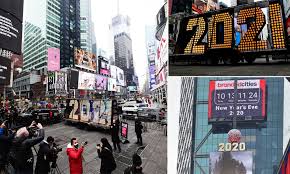 The tradition continues, and the countdown begins! People Gather To Watch The 2021 Numbers Being Lit In Times Square Before They Re Moved For Ball Drop Daily Mail Online
