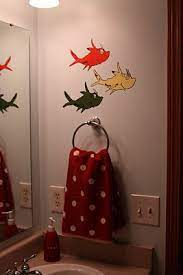 Seuss wall hanging and i was instantly smitten… Decorating The Dorchester Way Dr Seuss Bathroom Kid Room Decor Bathroom Kids Seuss Classroom