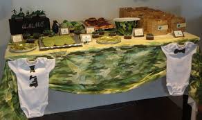 Here's a unique idea for a baby boy shower.make your own props and stick them in a painted coffee can. No Place Like Home Little Green Army Men Baby Boy Shower Camouflage Baby Shower Baby Shower Camo Camouflage Baby