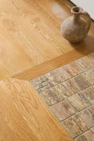Transitions From Tile To A Wood Floor In A Doorway Ceramic Floor Tiles House Flooring Flooring