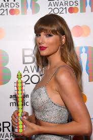 Taylor swift accepts global icon award at 2021 brits: Taylor Swift Attends The Brit Awards 2021 At The O2 Arena In London Uk 110521 30