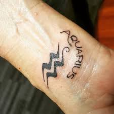 120 god is love tattoo; Aquarius Wrist Tattoo By Stefanee Schofield Tattoonow