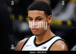 Iowa forward Keegan Murray sits