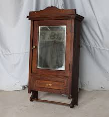 The mirror design creates an extra useful function. Bargain John S Antiques Antique Oak Medicine Cabinet With Towel Bar Bargain John S Antiques