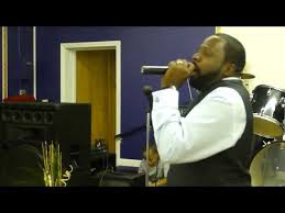 Bishop Designate Aaron Clyburn ministering at By Faith Worship Center