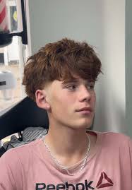 Bowl Cut and Gold Hoop Earrings: A 90s Inspired Look