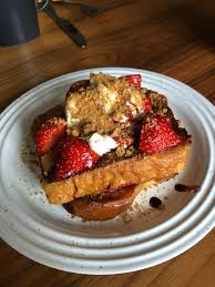 In france, french toast is generally served as a sweet dish and toasts may be topped with sugar (often powdered sugar), chocolate, butter, fruit, jam, or honey. I Made The Sweet French Toast Recipe And Topped It With Strawberries Greek Yogurt Pomegranate Molasses And Crushed Ginger Nut Biscuits Sortedfood