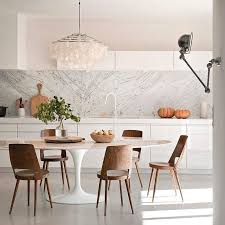 Saarinen table are available with marble tops or laminated wood tops. Replica Eero Saarinen Oval Tulip Dining Table U3 Shop
