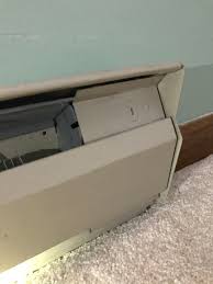 Cutting a hole in the wall to get the end of the wire, patching. Removing Baseboard Heater With No Screws Home Improvement Forum