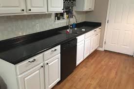 I'm getting a small quartz countertop and backsplash made for my kitchen project. How To Diy Faux Marble Or Granite Counters For Under 100 Digital Trends