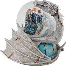Amazon.com: Enesco Harry Potter, Ron and Hermoine Riding Ukranian Ironbelly  Dragon Water Globe Waterball, 5.71 Inch, Multicolor : Home & Kitchen
