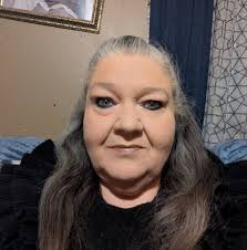 What critter takes the skin from shoulder to head off a chicken?