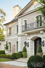 Not only does it unify the area, but the roof also helps to cool down rooms inside, helping to cut down on air conditioning use. This Neoclassical French Home By Harrison Design Radiates A Stately Presence With Materials That Include Limest Mediterranean Homes Facade House House Exterior