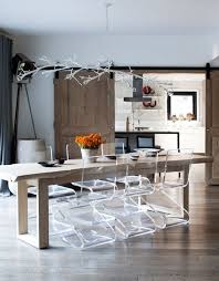 Barn Chic Gone Modern With Clear Lucite Chairs A Long Skinny Farmhouse Style Wood Dining Ta Farmhouse Dining Room Table Farmhouse Dining Room Farmhouse Dining