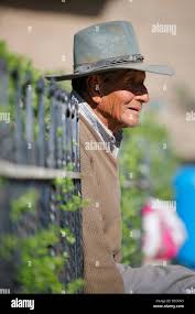 Man Sitting In The Main Square Of Cabanaconde Village Stock Photo Alamy