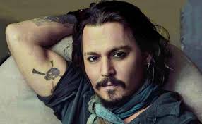 John christopher depp ii is an american actor, producer, and musician. Johnny Depp Really Like The Skull And Crossbone Tattoos Which Signify Danger He Has A Skull And Crossbone Tattoo On His Righ Johnny Depp Erkek Dovmeleri Sakal