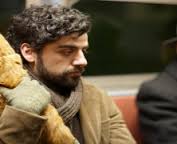 posted by Francis McKay. Opening with a simple subtitle, The Gaslight 1961, we meet Llewyn Davis (Oscar Isaac) on stage singing a tune into a gleaming ... - inside-llewelyn-davis-2