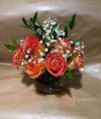 Rose Bowl Arrangement Orange Roses Baby S Breath Italian Ruscus Orange Roses Italian Ruscus Floral Arrangements
