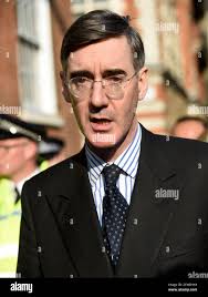 Photograph of Jacob Rees-Mogg. Jacob William Rees-Mogg (1969-) a British  politician serving as Leader of the House of Commons and Lord President of  the Council since 2019, and who has served as