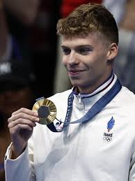 French swimmer Marchand wins gold with Olympic record in men's 400-metre  medley