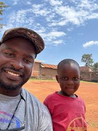 That's our guy!! Coach EJ Snyder sharing His goodness (& some football!)  with the children of Uganda. Please join us as we continue to pray and  support Coach's mission trip.