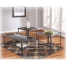 This coffee table set turns the tables on a monochromic look with opaque black glass tabletops complemented by sleek metal framing. T133 13 Ashley Furniture Calder Black Occasional Table Set