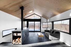 Minimalist Steel Cabin Floats Above A Rugged Slope In Quebec