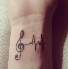 Collection of musical images which illustrate a treble clef in different interpretations on the background of waving lines. 65 Music Tattoo Ideas That Will Make The World Sing Tats N Rings