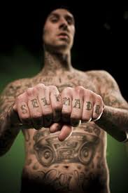 While speaking with tmz, travis barker reveals that his son landon would love to get a face tattoo thanks to inspiration from lil pump. T Barker Self Made Travis Barker Tattoos Hand Tattoos Travis Barker