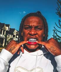 Alabama Football Player's Grill Sparks Debate