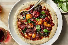 Creamy Polenta With Burst Cherry Tomato And Red Wine Ragout Recipe In 2021 Wine Recipes Tomato Recipes Vegetarian Main Dishes
