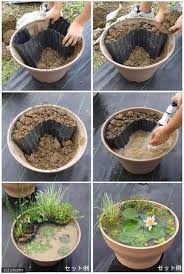 Easy Homemade Water Garden Add A Few Minnows To Keep Mosquitoes At Bay Water Gardens Diy Diy Garden Projects Container Water Gardens