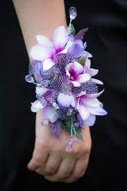 Custom Purple And Lavender Corsage Wristlet By Viviano Flower Shop With A Black Prom Dress Prom Flowers Corsage Wrist Corsage Prom Prom Corsage And Boutonniere