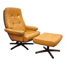 Home office features a wood desk paired with a caramel colored leather task chair illuminated by a brass drum pendant. Caramel Leather Office Chair Review At En Mdg Sdg3d Undp Org